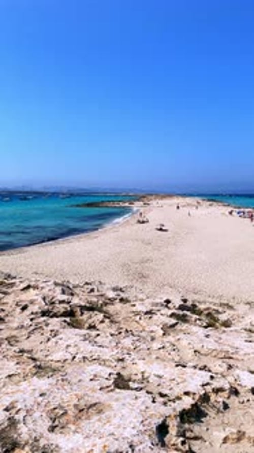 Vibrant summer day of pristine sandbar, Ses Illetes Beach, Formentera