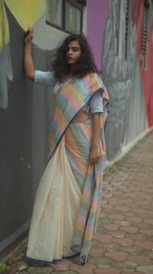 Woman in Saree Posing by Urban Wall