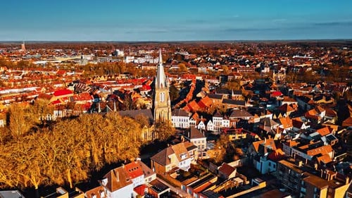 Stunning aerial view of Bruges showcasing historic architecture in autumn