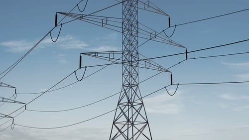 High Voltage Electricity Tower and Power Lines Under the Beautiful Sky. Energy