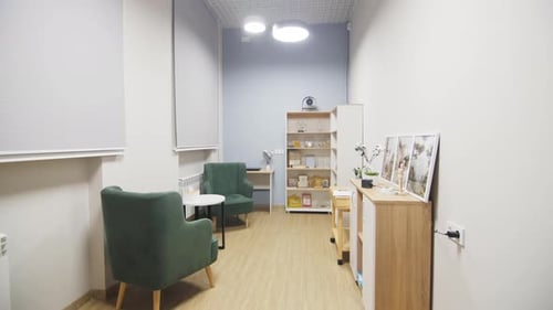 Coffee Table and Comfortable Armchairs at Place to Rest