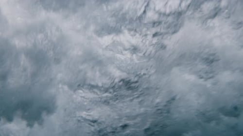 Underwater view of the breaking wave in the Maldives