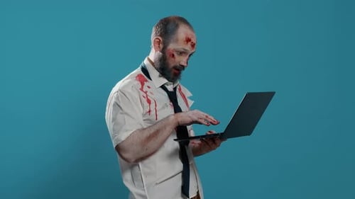 Zombie Using Laptop with Shocked Expression