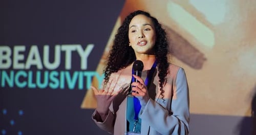 Speaker Presenting at Tech Conference About Beauty Inclusivity