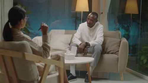 Man Talking to Therapist During a Therapy Session