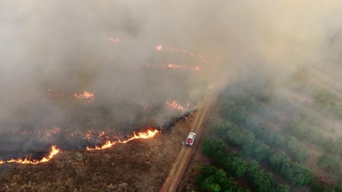 Uhd Fire Sweeping Through Harvested Farmland