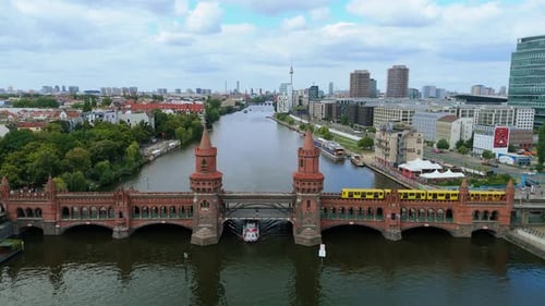SBahn Train Crossing the Oberbaum Bridge or Oberbaumbruecke Over the River Spree in Berlin