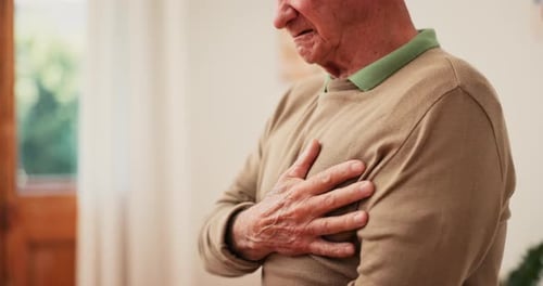 Hands, senior man and heart attack with pain, cardiovascular healthcare