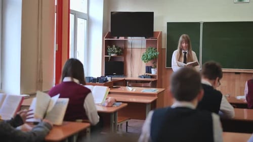 Berezovka Belarus September 25 2023 A Teacher in a Classroom Teaching Young Students