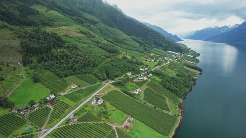 Serene lakes and winding rivers in Norway's aerial perspective.