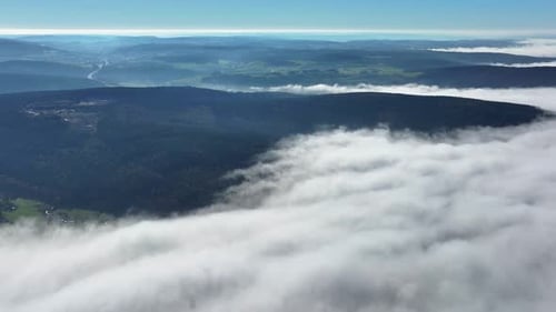 Aerial view of cloudscape over forests, Germany.