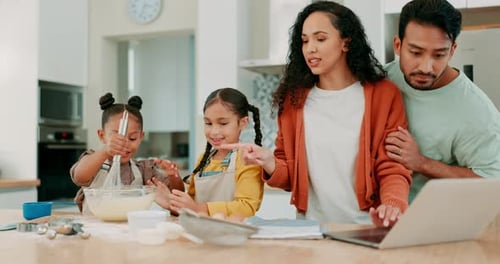 Family Baking Together in Bright Kitchen at Home