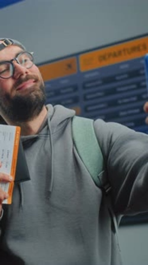 Airport Terminal Happy Male Passenger Holding Plane Ticket Taking Selfie Using Smartphone