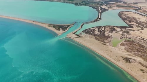 Drone Footage of Stunning Turquoise Lagoon and Sandy Beach Coastline