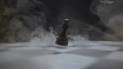 Chess Piece in Smoke on Checkerboard Evokes Mystery and Tension