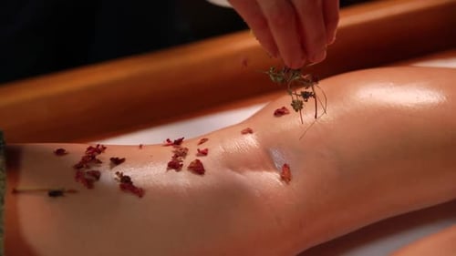 Ayurvedic massage for beautiful woman in spa