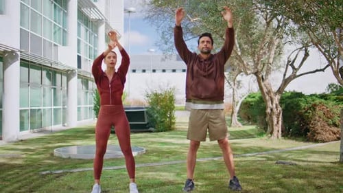 Active Athletes Training Park in Morning Focused Man Woman Preparing Workout