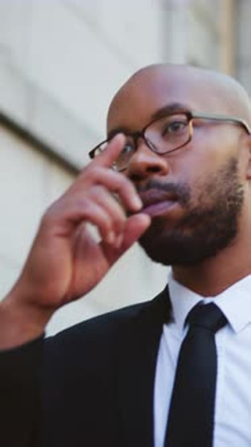 Serious, black man and lawyer walking with glasses in city for court case or ready for testimony