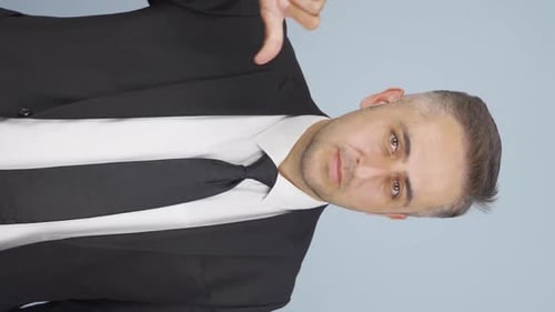 Vertical video of Negative businessman.