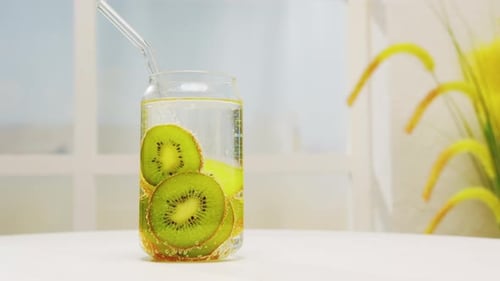 Refreshing Kiwi Slices in Sparkling Water