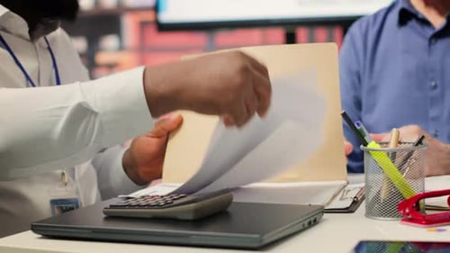 Colleagues Collaborating in a Modern Workplace Office
