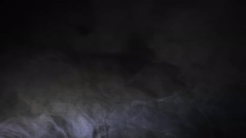 Ethereal Smoke Floating on a Black Background