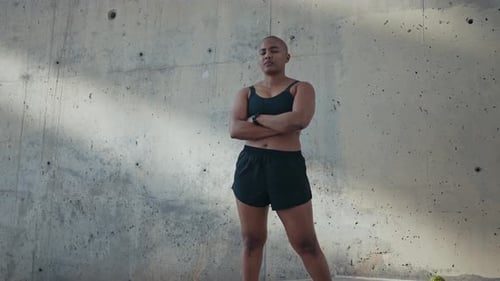 shaved woman making sport outdoor.