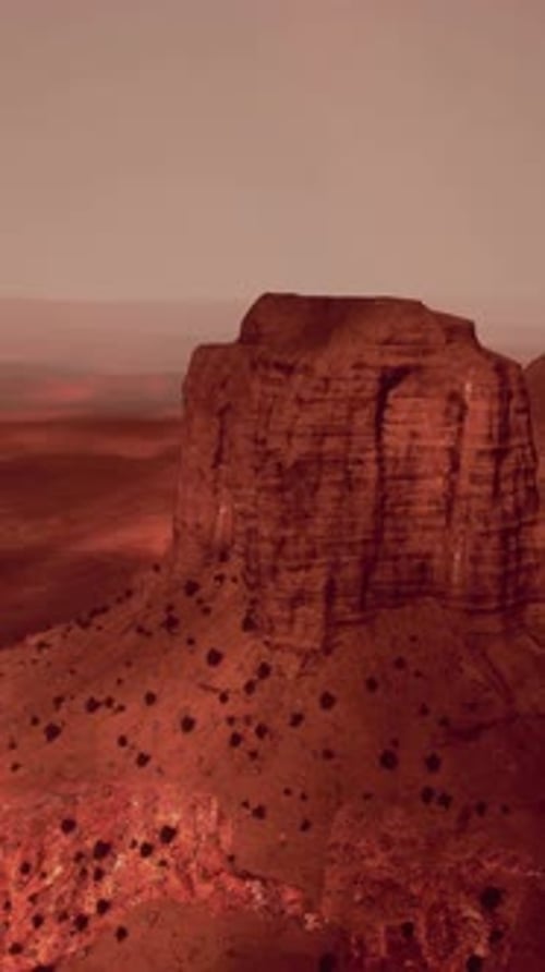 A Large Rock Formation in the Middle of a Desert