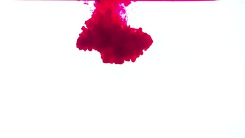 Red Ink Spreading in Water Abstract Fluid Motion
