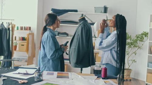 Successful Fashion Designers Work with a Mannequin Fashion Industry