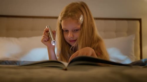 Curious Caucasian Child Little Girl Reading Book Instructive Story Textbook Daughter Lying Bed