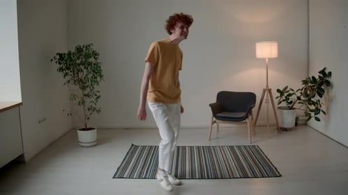 Gen Z Guy Feeling Super Excited and Dancing at Home