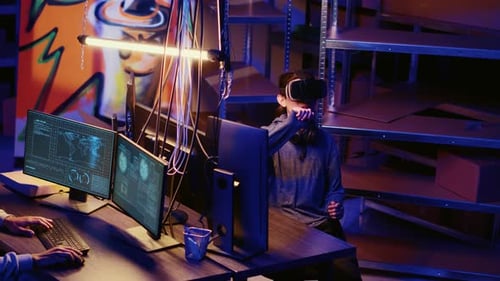 Hacker Coding Malware with VR Headset