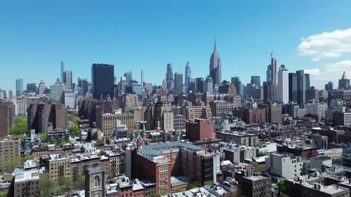 Iconic skyline of new york city and US Flag