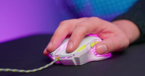 Hand Clicking White Gaming Mouse Close Up