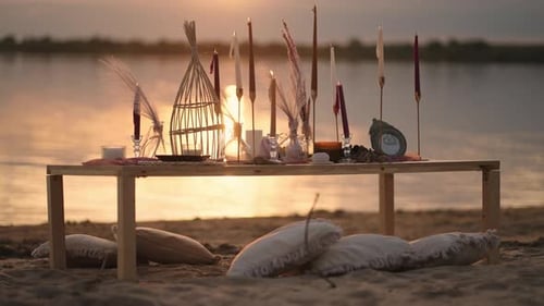 Romantic Place For Date Or Wedding On Beach Or Lake In Sunset Decoration On Table On Sandy Coast