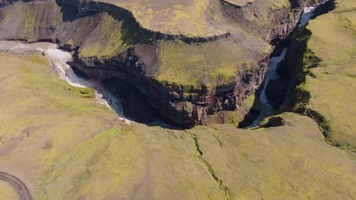 Aerial view of canyon and river in rugged landscape, Iceland.