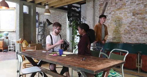 Young entrepreneurs in a meeting discussing VR
