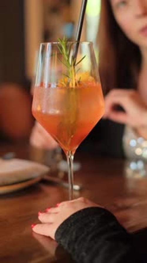 Refreshing Cocktail in Tall Glass with Ice