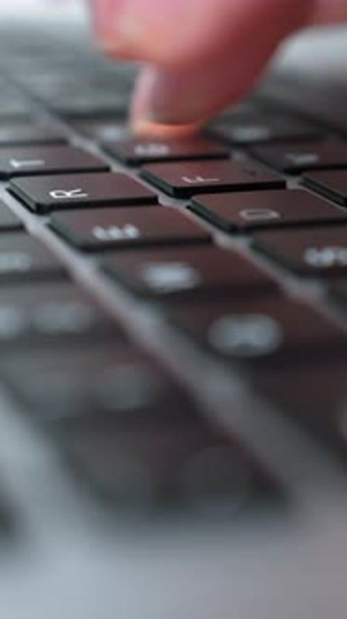 Close Up of Hands Typing on Keyboard