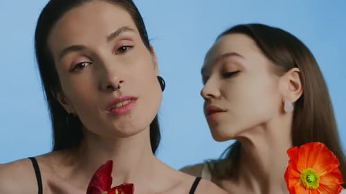 Models Showcasing Floral Fashion in a Vibrant Studio Setting