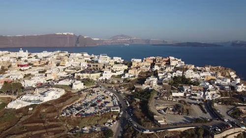 Scenic Coastal Village Aerial View on Sunny Day