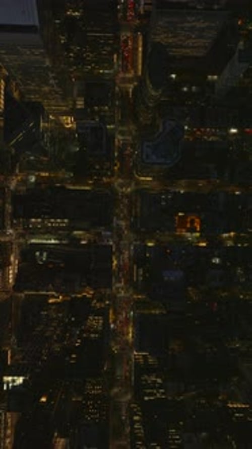 Illuminated Manhattan Streets Come Alive at Night in Slow Motion Featuring Vibrant Lights Busy