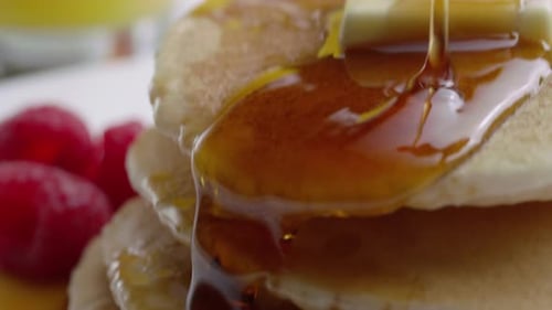 Pouring Syrup Onto Pancakes, Closeup Background