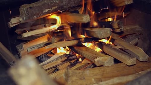 Burning Firewood Close Up in a Contained Space