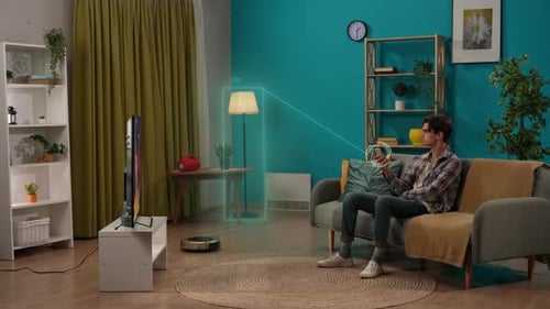 Young Adult Controls Smart Home Devices Remotely