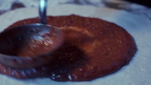 Cook Puts Tomato Sauce On Pizza Dough pizza 4K 120fps - B-roll