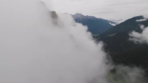Aerial view of mountains and clouds, Italy.