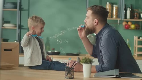 A Cheerful Father With Adorable Son Spent Time Together at Home