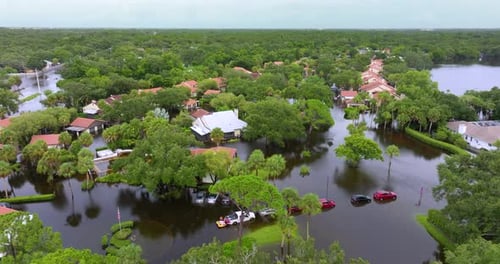 Hurricane Flooded Homes in Residential Community in Florida USA Aftermath of Natural Disaster